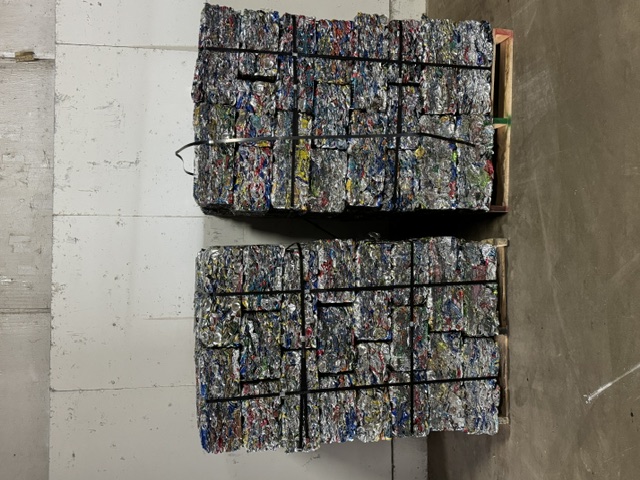 Pallets of baled aluminum cans ready for shipment