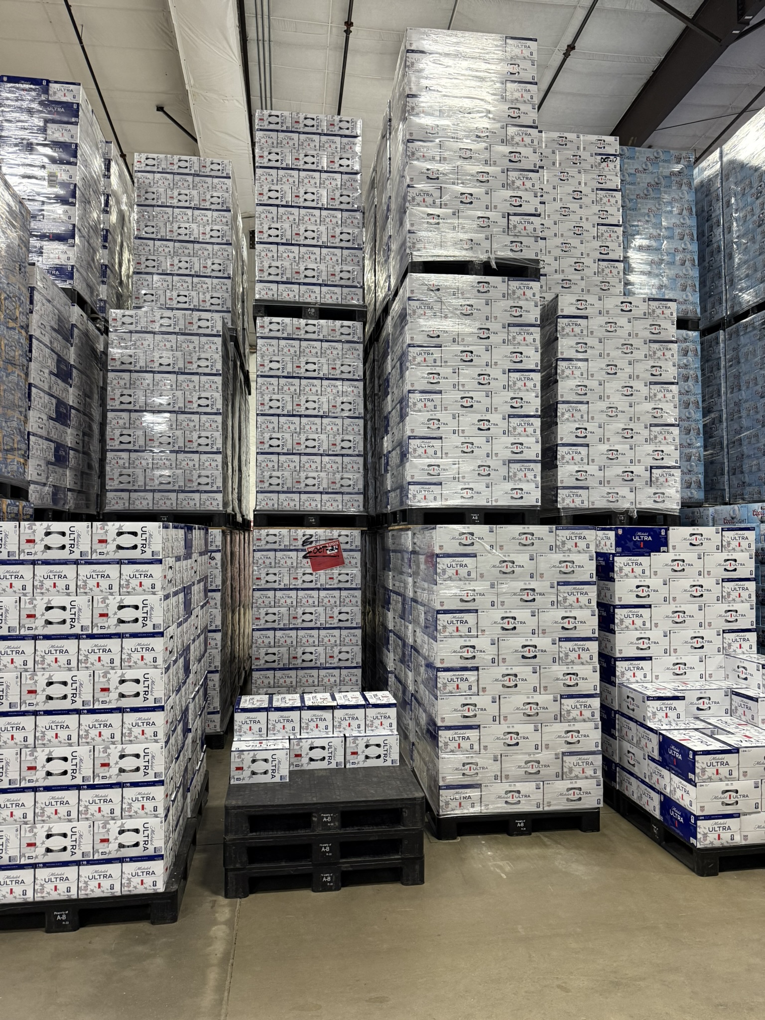 Towering pallets of Michelob Ultra and Coors Light